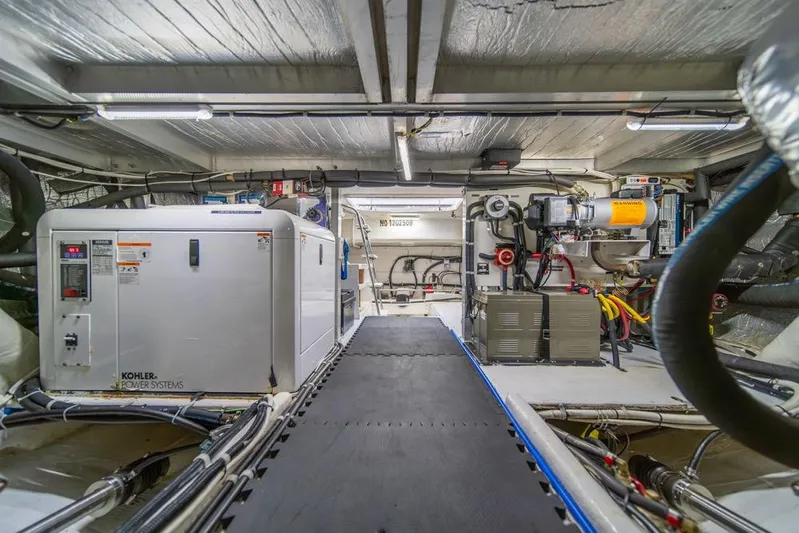 Restless II Yacht Photos Pics Engine room of 2007 Navigator Classic 48 yacht with Kohler power systems.