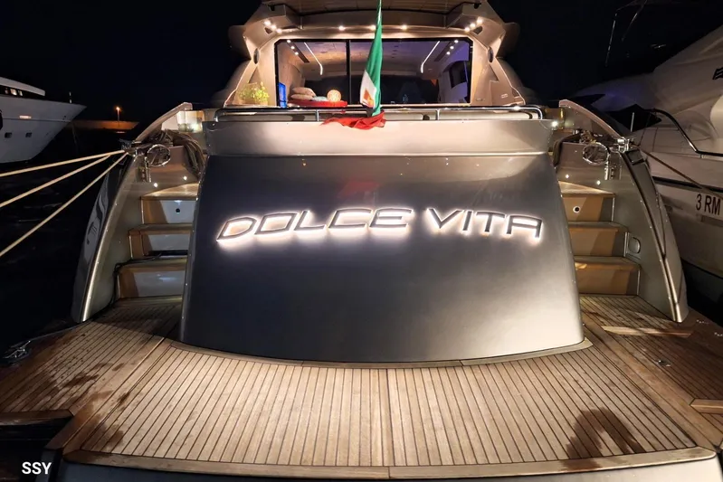  Yacht Photos Pics Luxury Pershing 72 yacht "Dolce Vita" docked at night, 2008 model.