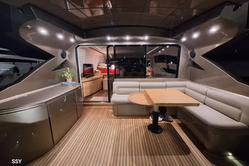  Yacht Photos Pics Luxurious interior of 2008 Pershing 72 yacht with elegant seating and modern design.