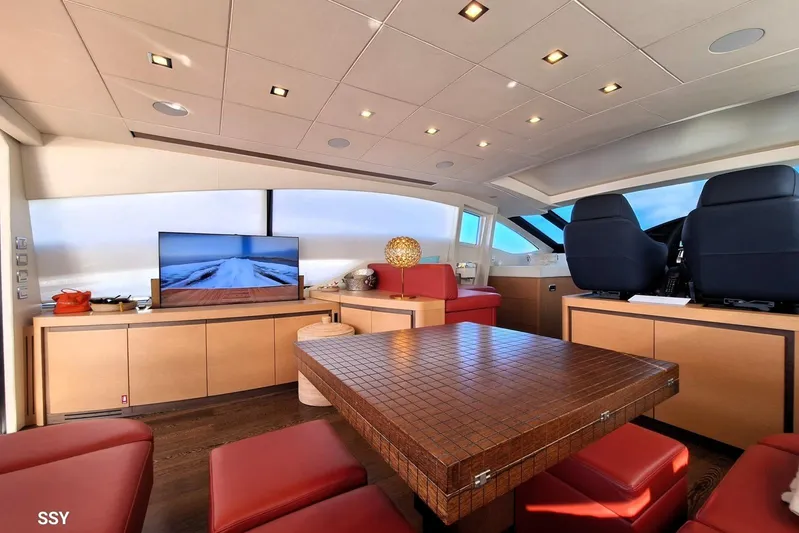  Yacht Photos Pics Luxurious interior of 2008 Pershing 72 yacht with modern seating and entertainment system.