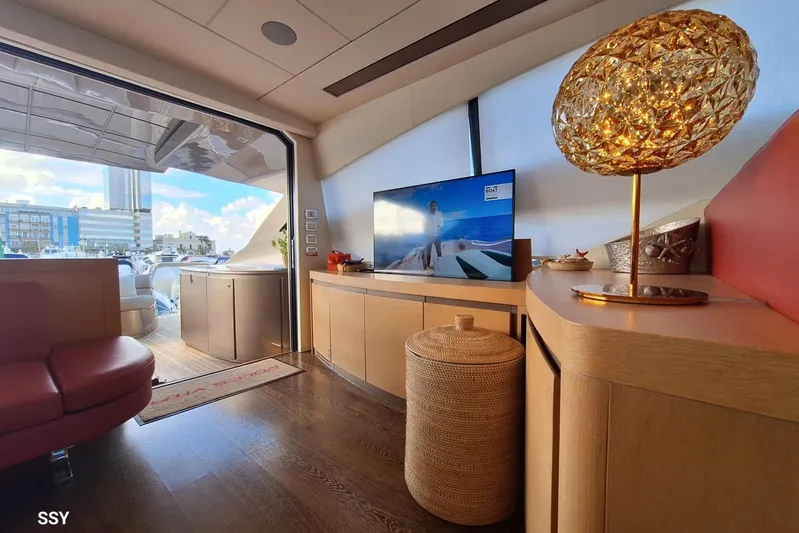  Yacht Photos Pics Luxurious interior of 2008 Pershing 72 yacht with modern decor and scenic view.