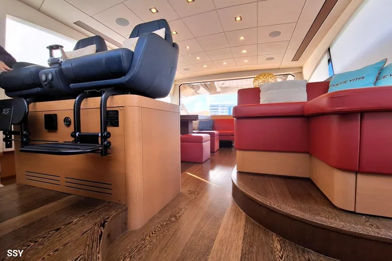  Yacht Photos Pics Luxurious interior of 2008 Pershing 72 yacht with modern seating and elegant wood flooring.