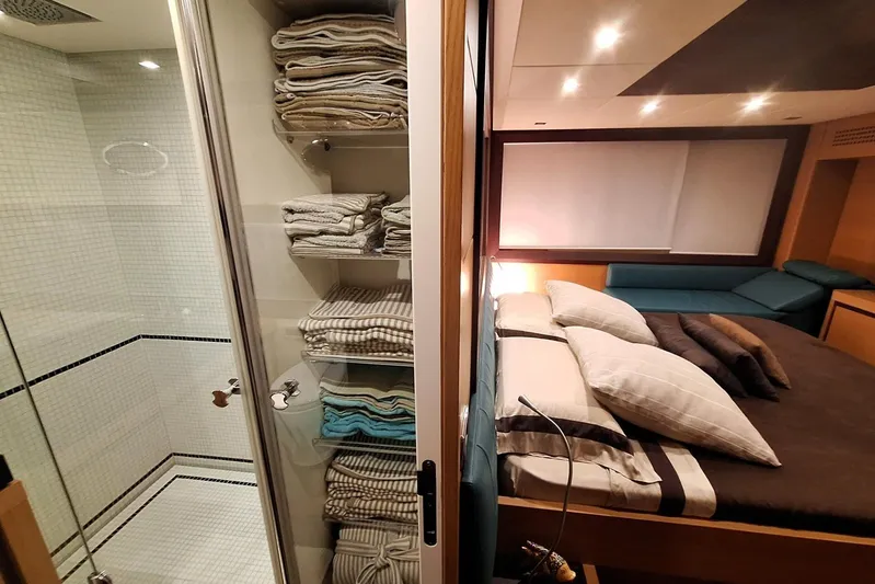  Yacht Photos Pics Luxurious 2008 Pershing 72 yacht interior with cozy bedroom and modern bathroom.