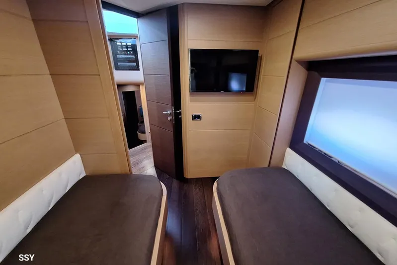  Yacht Photos Pics Interior of 2008 Pershing 72 yacht with twin beds and modern decor.