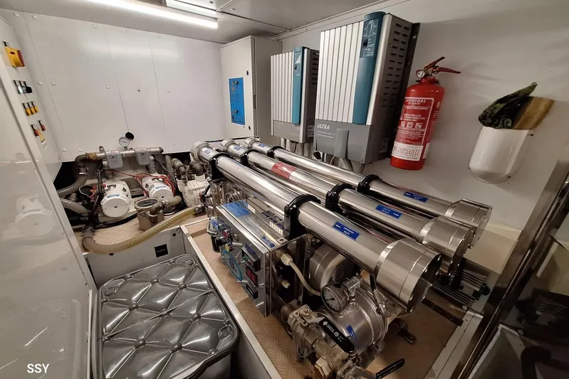  Yacht Photos Pics Engine room of a 2008 Pershing 72 yacht, featuring advanced machinery and equipment.