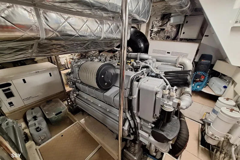  Yacht Photos Pics Engine room of a 2008 Pershing 72 yacht, featuring a Kohler power system.