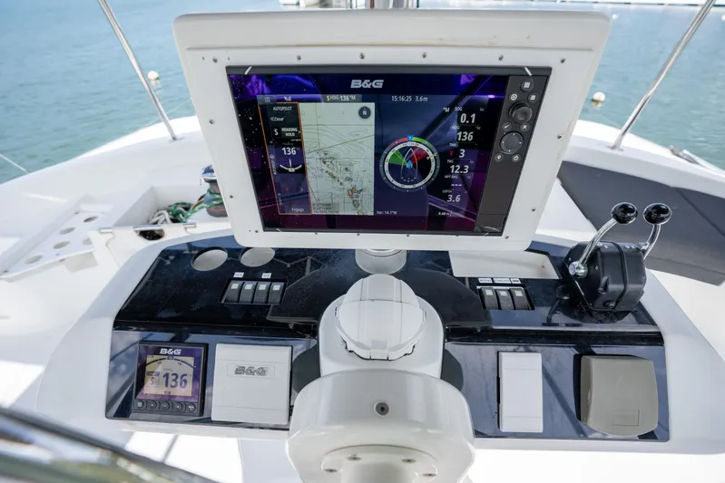 Blue Octane Yacht Photos Pics Cockpit of 2018 Lagoon 52 F yacht with navigation display and controls.