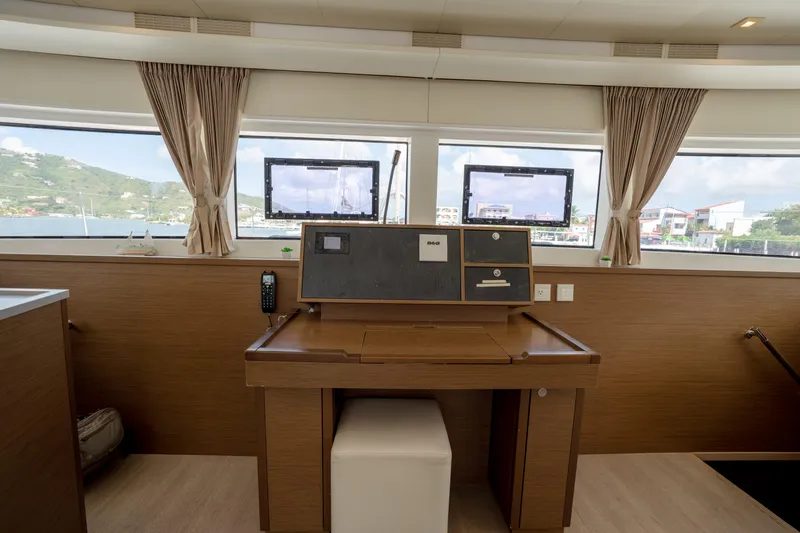 Blue Octane Yacht Photos Pics Interior of 2018 Lagoon 52 F yacht with navigation station and scenic windows.