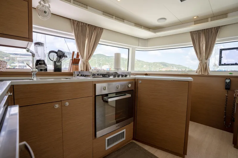 Blue Octane Yacht Photos Pics Modern kitchen interior on 2018 Lagoon 52 F yacht with appliances and scenic window views.