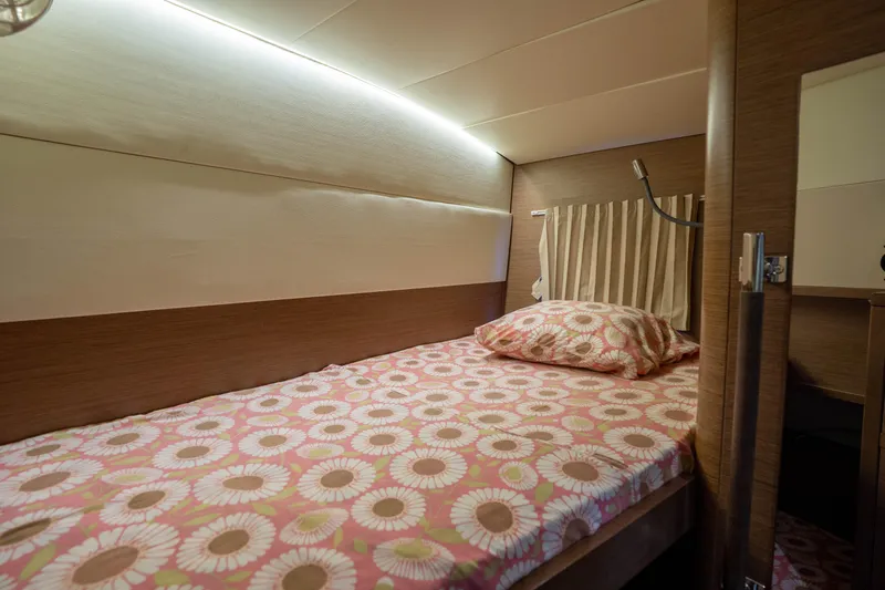 Blue Octane Yacht Photos Pics Cozy cabin interior of 2018 Lagoon 52 F yacht with floral bedding.