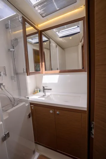 Blue Octane Yacht Photos Pics Modern bathroom in 2018 Lagoon 52 F yacht with sleek fixtures and natural lighting.