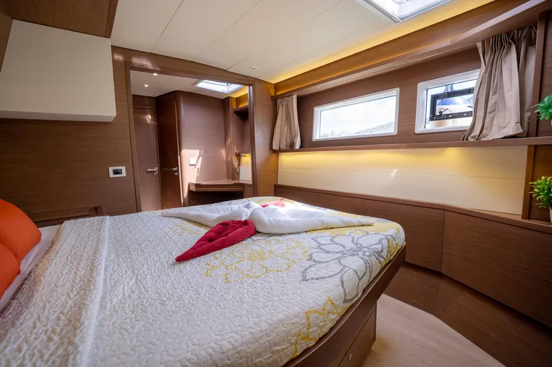 Blue Octane Yacht Photos Pics Luxurious cabin interior of 2018 Lagoon 52 F yacht with elegant wood finish.