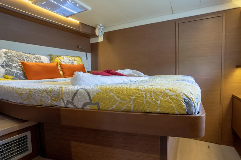 Blue Octane Yacht Photos Pics Luxurious cabin interior of 2018 Lagoon 52 F yacht with cozy bedding.