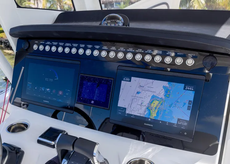  Yacht Photos Pics 2024 World Cat 260CC dashboard with navigation screens and control panel.