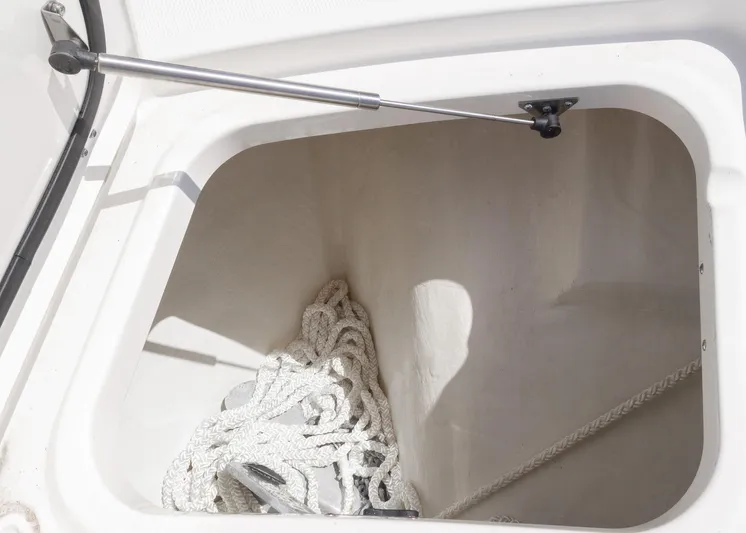  Yacht Photos Pics 2024 World Cat 260CC storage compartment with coiled rope inside.