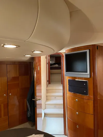 Mercia Yacht Photos Pics Interior of 2002 Azimut 55 Flybridge yacht with wood paneling and modern amenities.