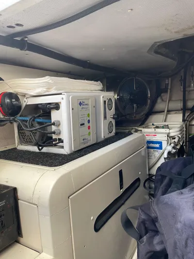 Mercia Yacht Photos Pics Engine room of 2002 Azimut 55 Flybridge yacht with equipment and wiring.