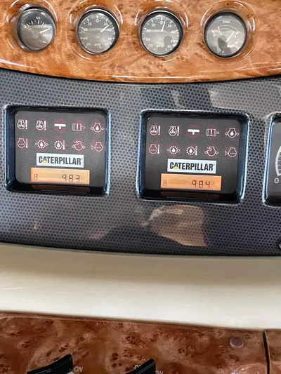 Mercia Yacht Photos Pics Dashboard of a 2002 Azimut 55 Flybridge with Caterpillar engine displays.