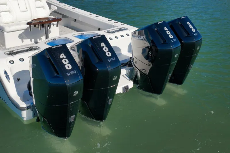  Yacht Photos Pics 2023 Freeman 43 boat with four Mercury 400 V10 outboard engines on water.