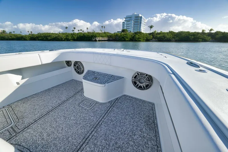  Yacht Photos Pics 2023 Freeman 43 boat interior with speakers, scenic waterfront view, and modern design.