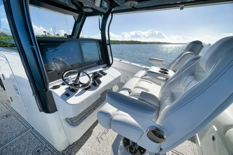  Yacht Photos Pics 2023 Freeman 43 boat interior with modern helm and luxurious seating.