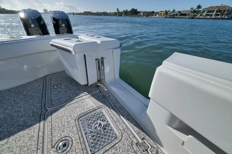  Yacht Photos Pics Freeman 43 boat deck with dual Mercury engines, 2023 model, on calm water.