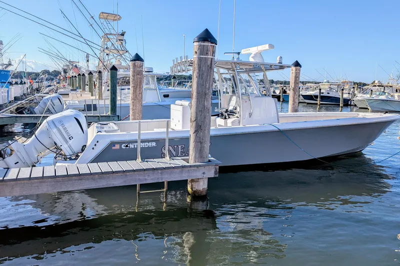  Yacht Photos Pics 2017 Contender 32 ST boat docked with Yamaha outboard engines.