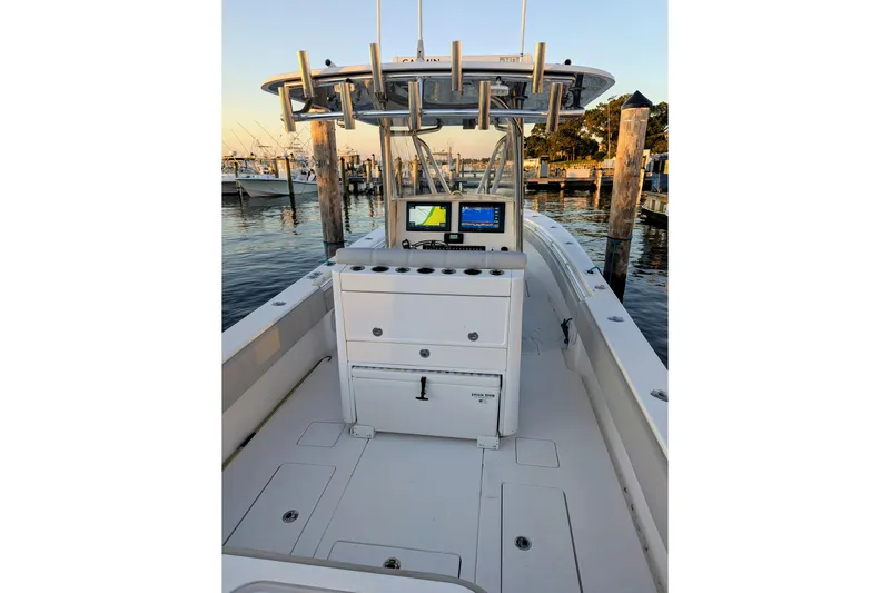  Yacht Photos Pics 2017 Contender 32 ST boat interior with navigation system at marina.