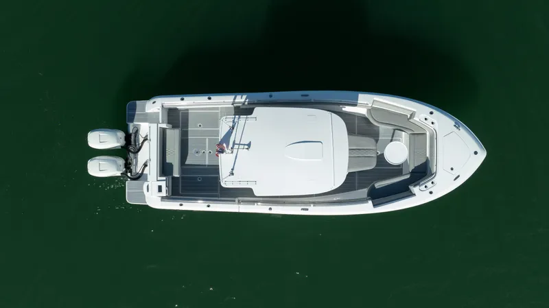  Yacht Photos Pics Overhead view of 2018 Belzona 325 Center Console boat on water.