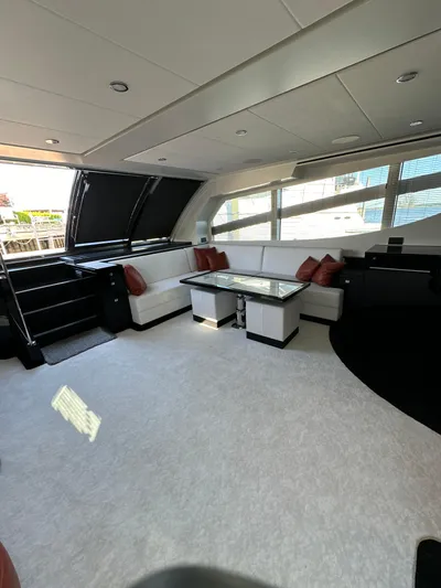 Lucy Penguin Yacht Photos Pics Luxurious interior of 2019 Van der Valk BeachClub 600 yacht with modern seating and large windows.