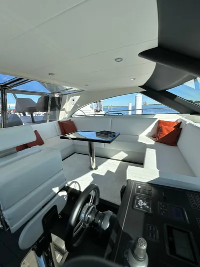 Lucy Penguin Yacht Photos Pics Luxurious 2019 Van der Valk BeachClub 600 yacht interior with modern seating and helm.