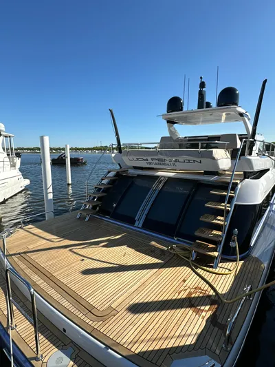 Lucy Penguin Yacht Photos Pics 2019 Van der Valk BeachClub 600 yacht docked, showcasing sleek design and spacious deck.