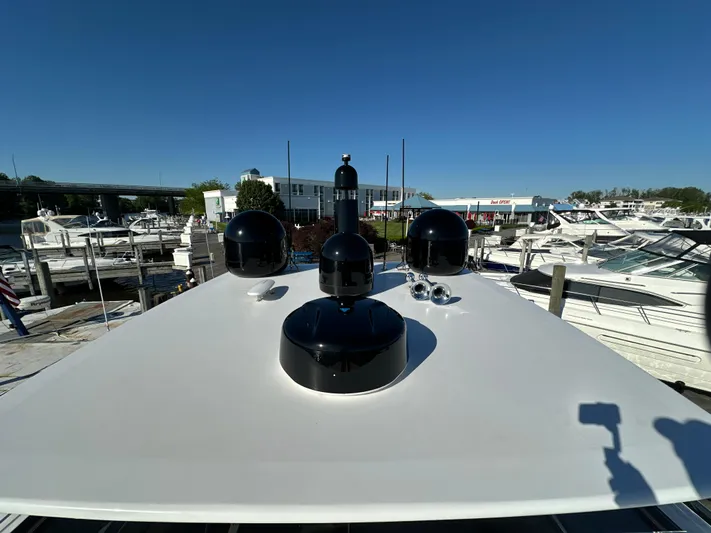 Lucy Penguin Yacht Photos Pics Van der Valk BeachClub 600 yacht deck with navigation equipment, docked at a marina, 2019 model.