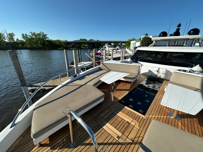 Lucy Penguin Yacht Photos Pics Van der Valk BeachClub 600 yacht, 2019 model, with spacious deck and seating by the water.