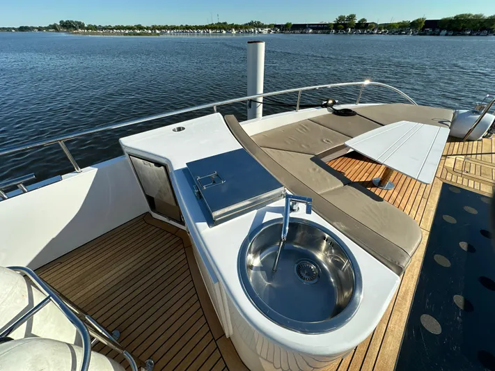 Lucy Penguin Yacht Photos Pics Luxurious 2019 Van der Valk BeachClub 600 yacht deck with sink and seating area.