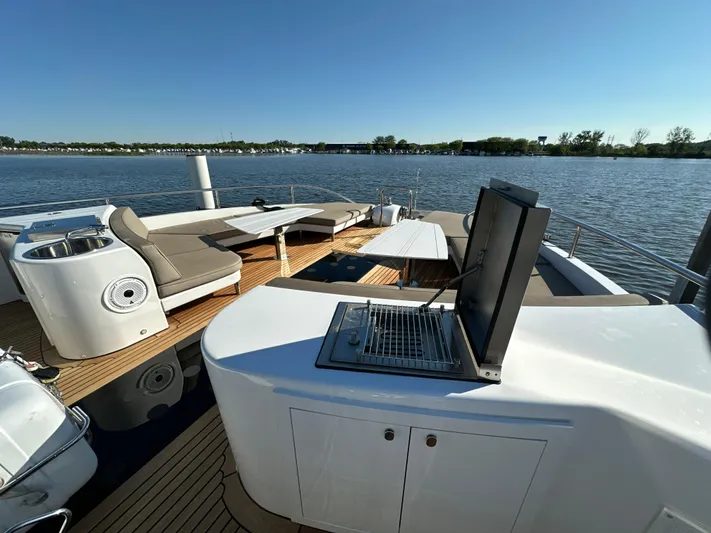Lucy Penguin Yacht Photos Pics Luxurious 2019 Van der Valk BeachClub 600 yacht deck with seating and grill.