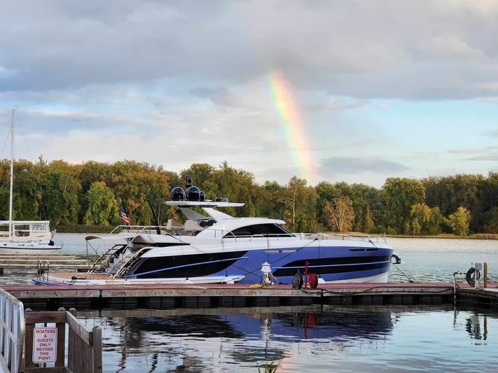 Lucy Penguin Yacht Photos Pics 2019 Van der Valk BeachClub 600 yacht docked with rainbow in background.