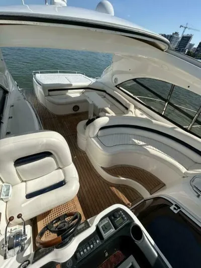  Yacht Photos Pics 2003 Sunseeker 50 Camargue yacht with spacious deck and luxurious seating.