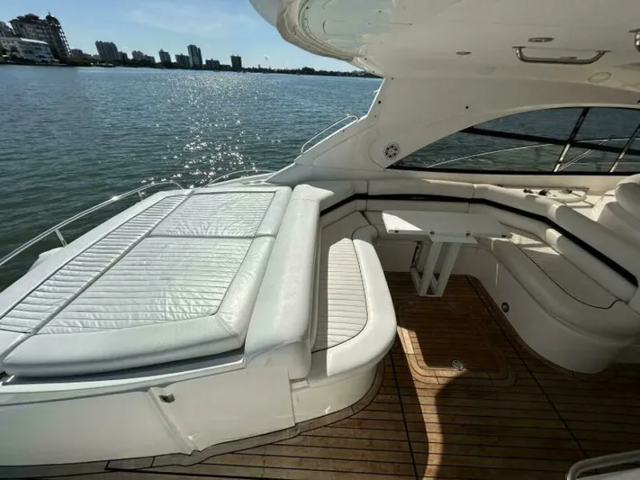  Yacht Photos Pics 2003 Sunseeker 50 Camargue yacht with spacious deck and waterfront view.