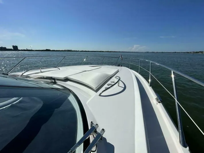  Yacht Photos Pics 2003 Sunseeker 50 Camargue yacht cruising on a sunny day.