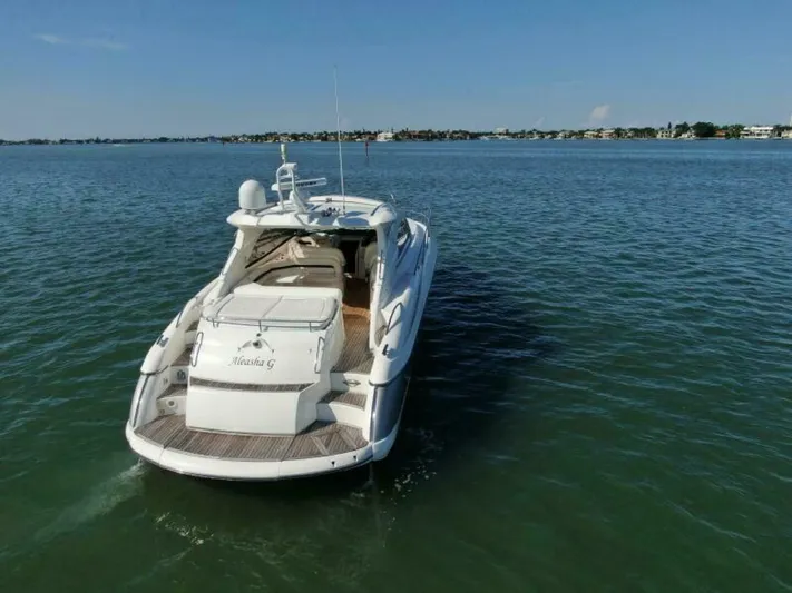  Yacht Photos Pics 2003 Sunseeker 50 Camargue yacht cruising on calm waters.