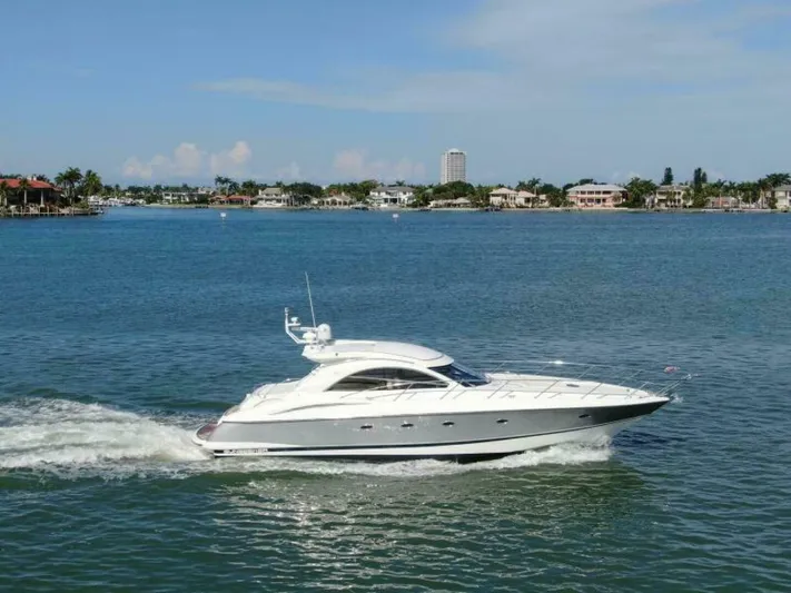  Yacht Photos Pics 2003 Sunseeker 50 Camargue yacht cruising on a sunny day.