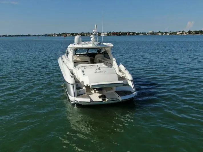  Yacht Photos Pics 2003 Sunseeker 50 Camargue yacht on calm waters.