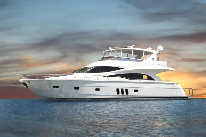 Tuff Ship Yacht Photos Pics 2007 Marquis 65 yacht on calm water at sunset.