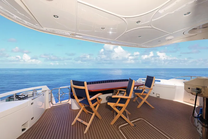 Tuff Ship Yacht Photos Pics Luxurious 2007 Marquis 65 yacht deck with ocean view and seating area.