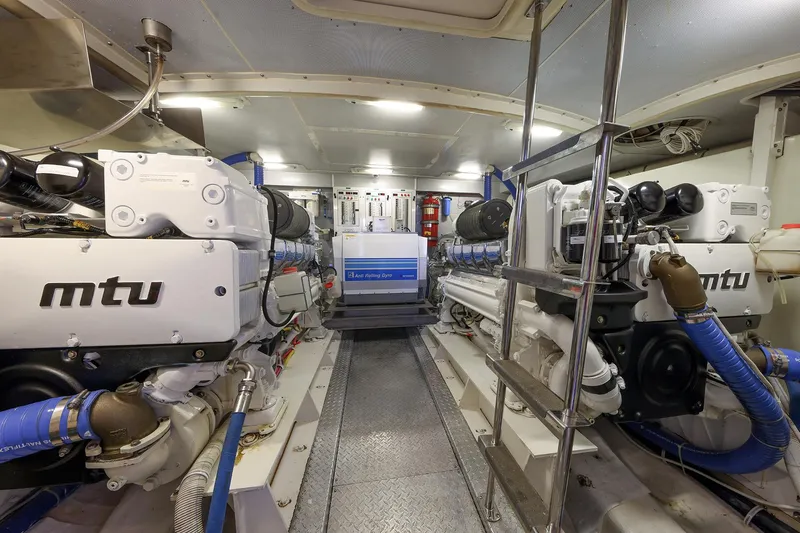 Tuff Ship Yacht Photos Pics Engine room of a 2007 Marquis 65 yacht with MTU engines and advanced equipment.