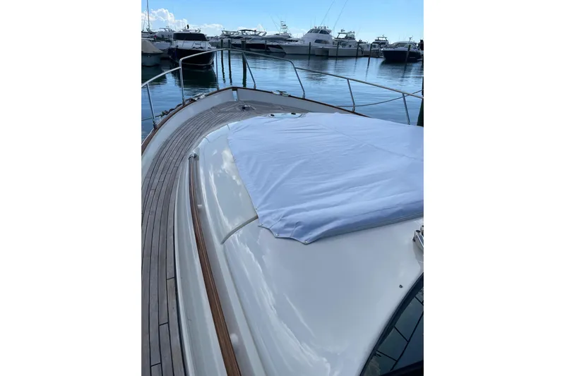  Yacht Photos Pics 2008 Mochi Craft DOLPHIN 44' yacht deck with marina view.