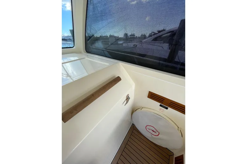  Yacht Photos Pics Interior view of 2008 Mochi Craft DOLPHIN 44' yacht with wooden flooring.