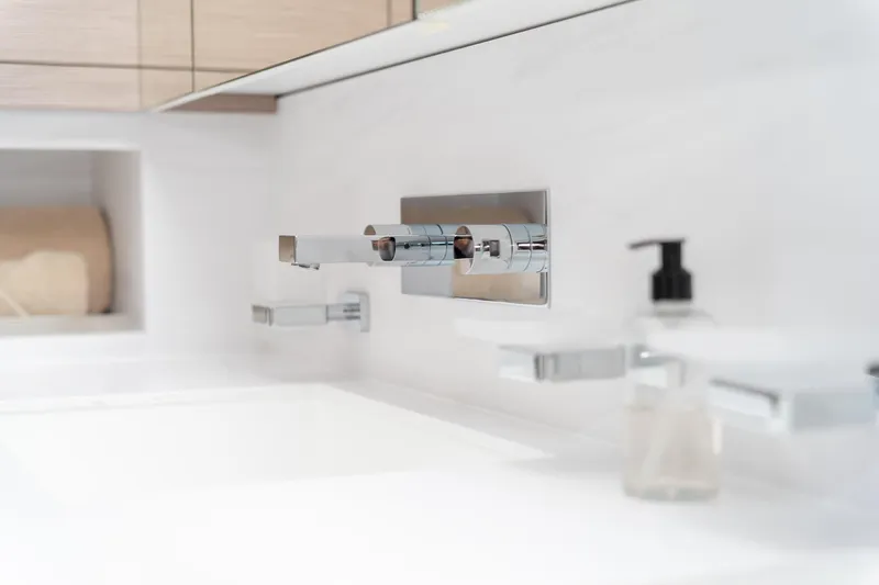 Jewel Yacht Photos Pics Modern bathroom sink with sleek chrome fixtures on Fountaine Pajot Alegria 2023 yacht.