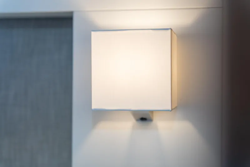 Jewel Yacht Photos Pics Modern wall light fixture on Fountaine Pajot Alegria 2023 yacht interior.